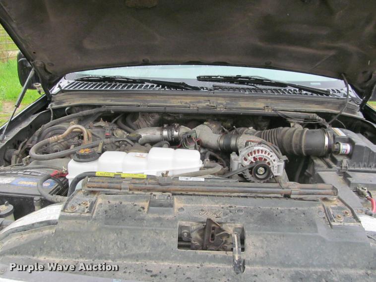 image for item K4757 2000 Ford F350 Super Duty XLT utility bed pickup truck