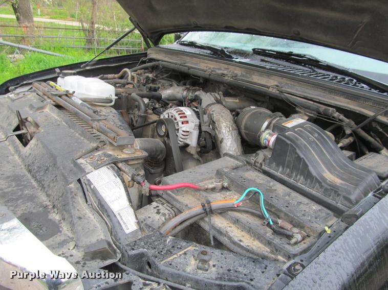 image for item K4757 2000 Ford F350 Super Duty XLT utility bed pickup truck