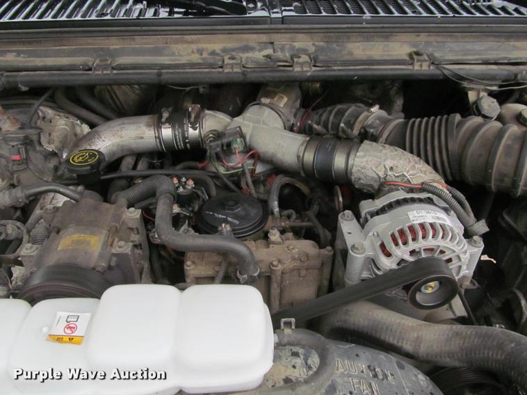 image for item K4757 2000 Ford F350 Super Duty XLT utility bed pickup truck