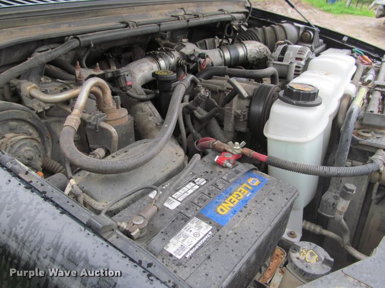 image for item K4757 2000 Ford F350 Super Duty XLT utility bed pickup truck