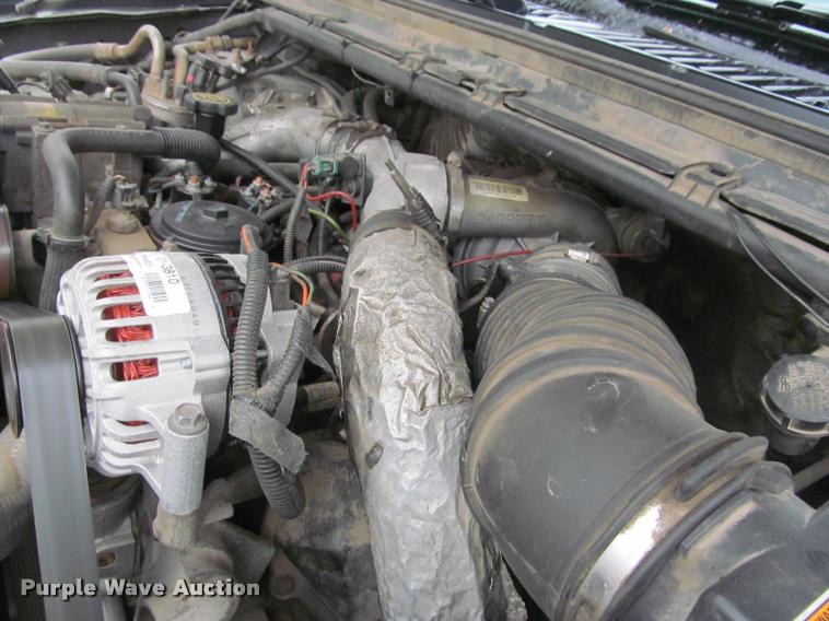 image for item K4757 2000 Ford F350 Super Duty XLT utility bed pickup truck