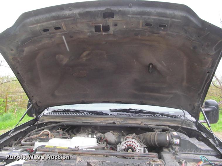 image for item K4757 2000 Ford F350 Super Duty XLT utility bed pickup truck