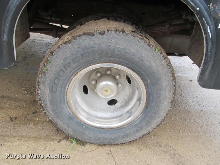 image for item K4757 2000 Ford F350 Super Duty XLT utility bed pickup truck