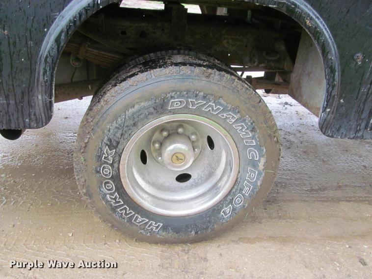 image for item K4757 2000 Ford F350 Super Duty XLT utility bed pickup truck