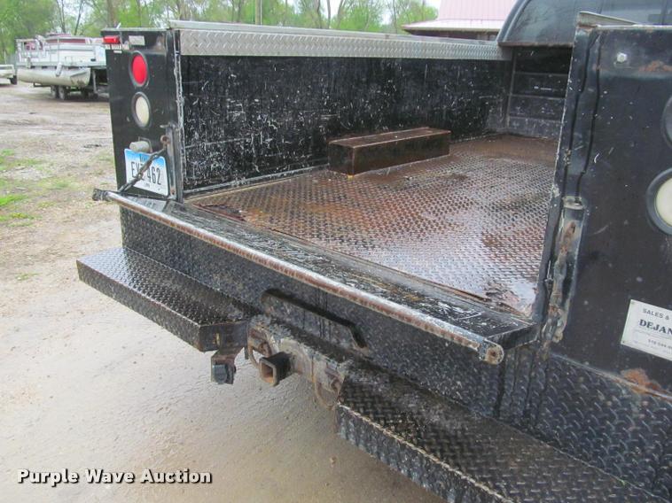 image for item K4757 2000 Ford F350 Super Duty XLT utility bed pickup truck