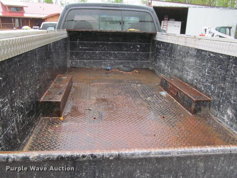 image for item K4757 2000 Ford F350 Super Duty XLT utility bed pickup truck