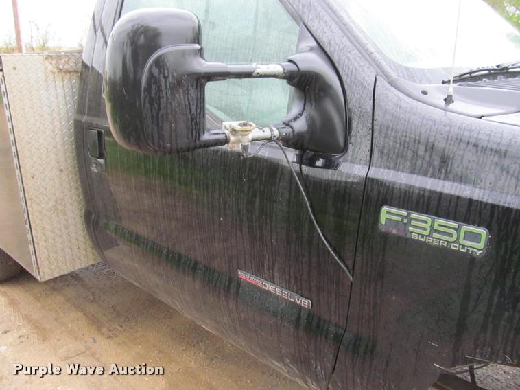 image for item K4757 2000 Ford F350 Super Duty XLT utility bed pickup truck