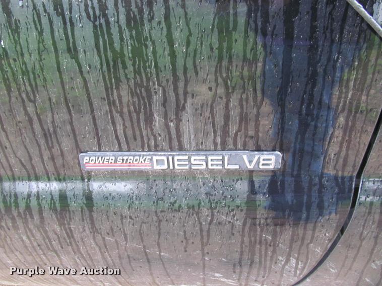 image for item K4757 2000 Ford F350 Super Duty XLT utility bed pickup truck