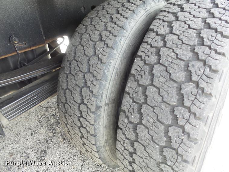 image for item K7613 2003 Chevrolet Silverado 3500 Crew Cab dump flatbed pickup truck