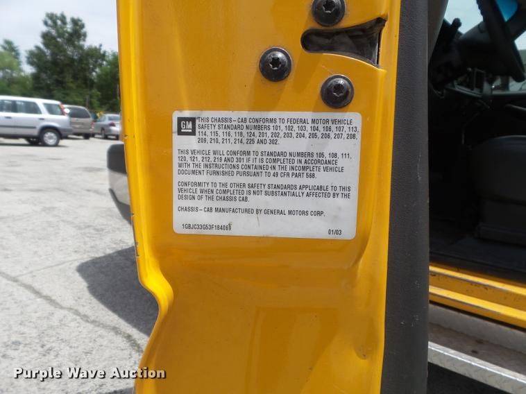 image for item K7613 2003 Chevrolet Silverado 3500 Crew Cab dump flatbed pickup truck