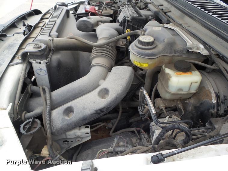 image for item L5566 2006 Ford F250 Super Duty flatbed pickup truck