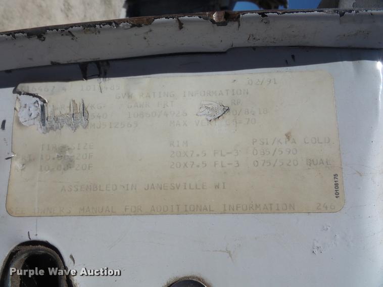 image for item DA8066 1991 GMC C7000 TopKick flatbed truck