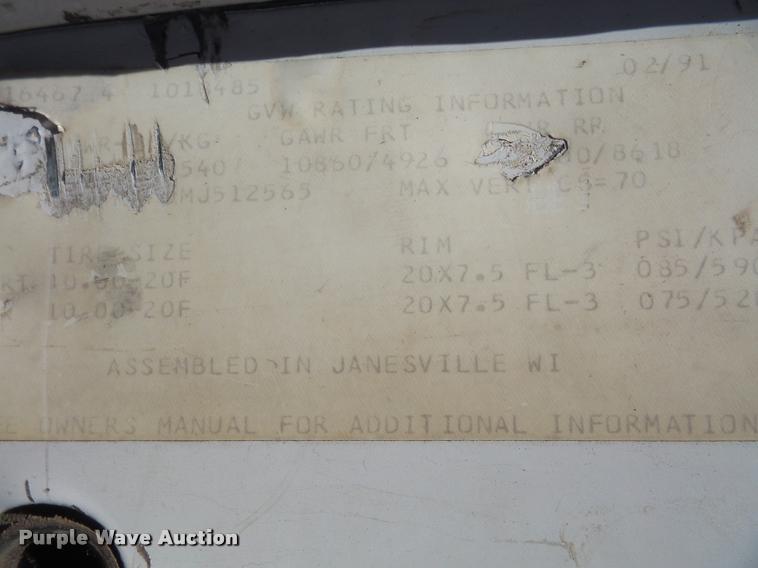 image for item DA8066 1991 GMC C7000 TopKick flatbed truck