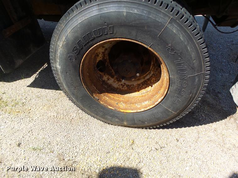 image for item DB1325 2002 International 4900 Crew Cab dump truck