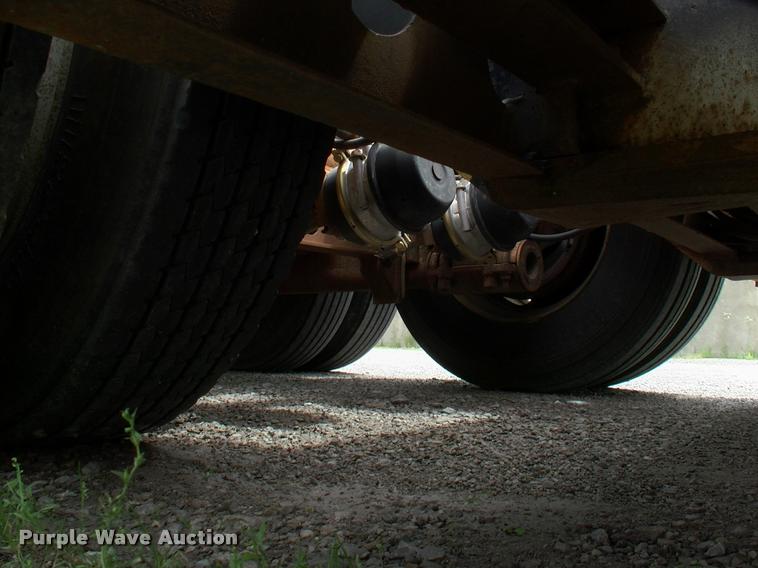 image for item DC7224 1987 Cozad lowboy equipment trailer with booster