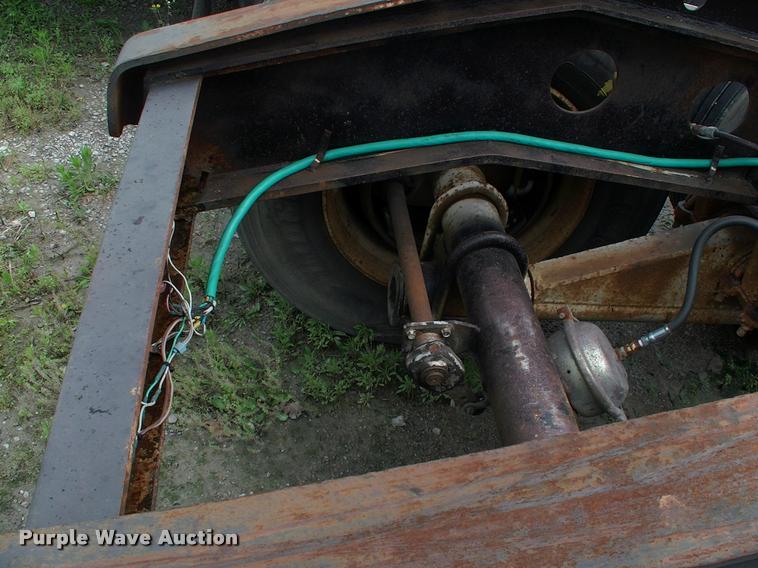 image for item DC7224 1987 Cozad lowboy equipment trailer with booster