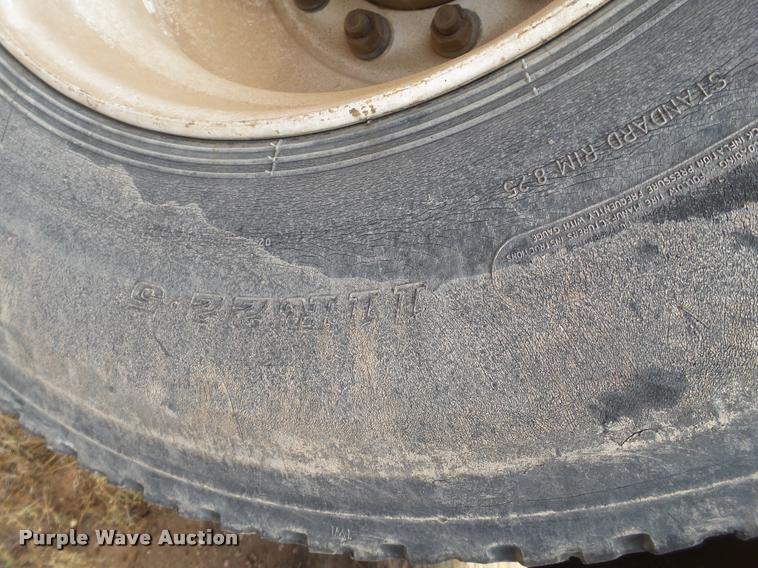 image for item DL9108 2003 Freightliner FL70 service truck with crane