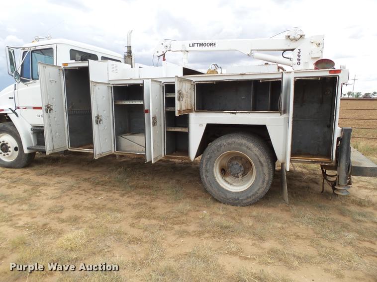 image for item DL9108 2003 Freightliner FL70 service truck with crane