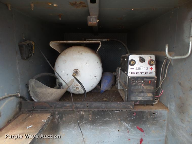 image for item DL9108 2003 Freightliner FL70 service truck with crane