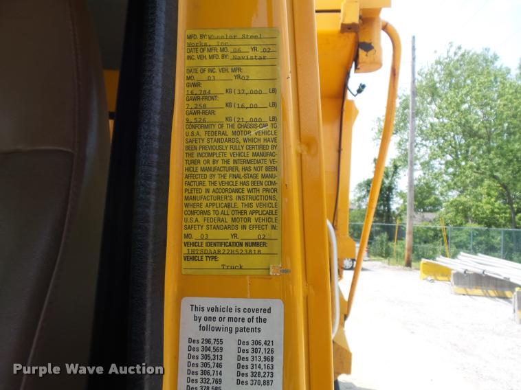 image for item K7638 2002 International 4900 Crew Cab dump truck