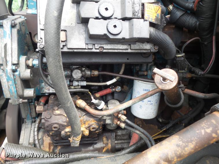 image for item K7641 2000 International 4900 Crew Cab dump truck