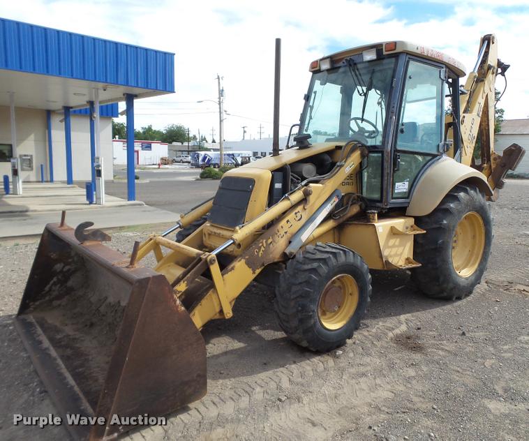 image for item L1519 Ford 555E backhoe
