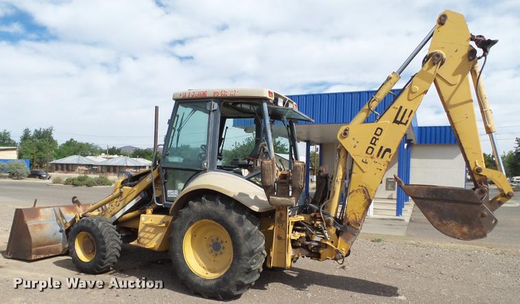 image for item L1519 Ford 555E backhoe