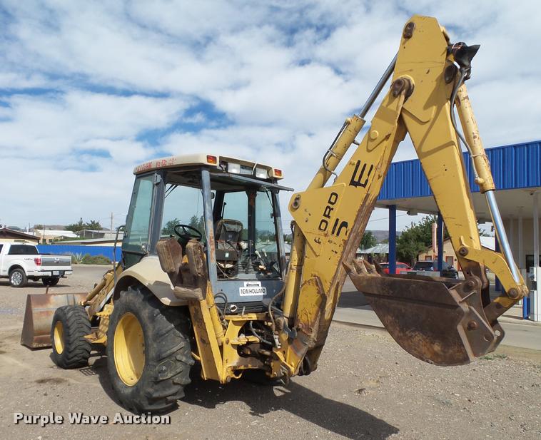 image for item L1519 Ford 555E backhoe