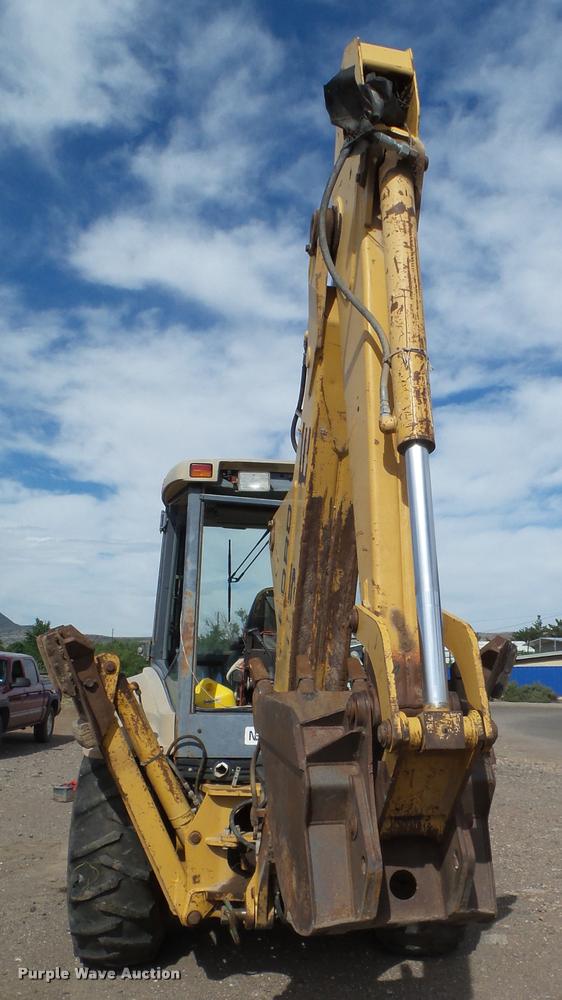 image for item L1519 Ford 555E backhoe