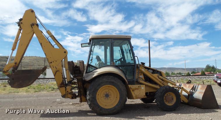 image for item L1519 Ford 555E backhoe