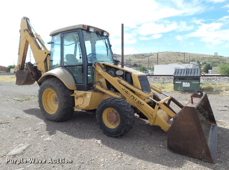 image for item L1519 Ford 555E backhoe
