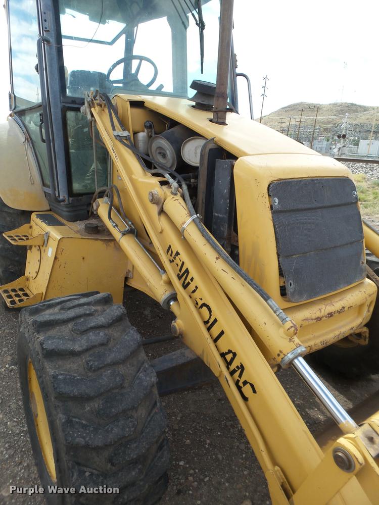 image for item L1519 Ford 555E backhoe