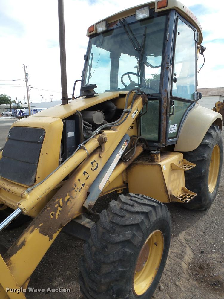 image for item L1519 Ford 555E backhoe