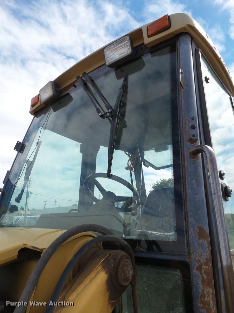 image for item L1519 Ford 555E backhoe
