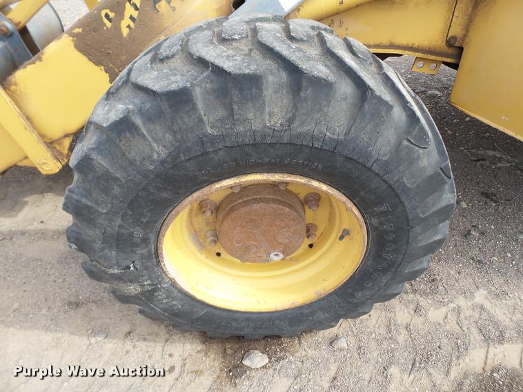 image for item L1519 Ford 555E backhoe