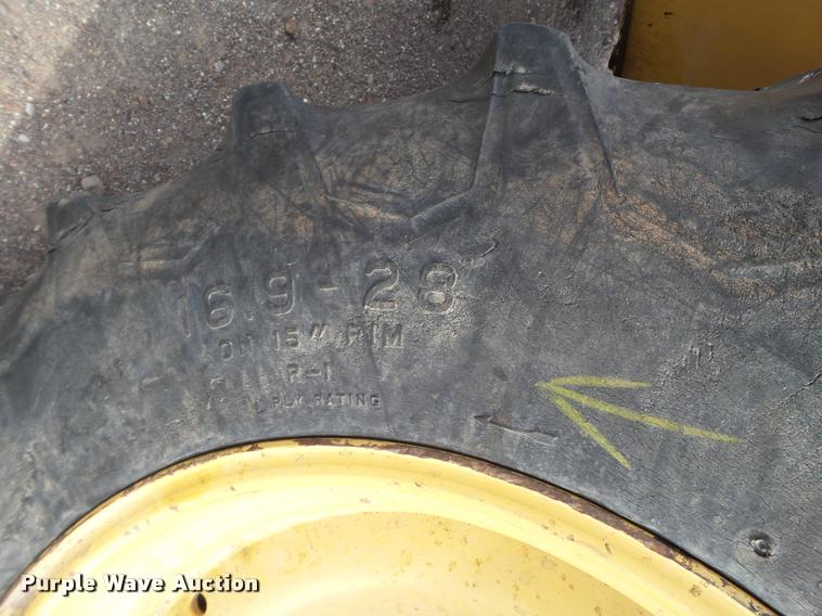 image for item L1519 Ford 555E backhoe