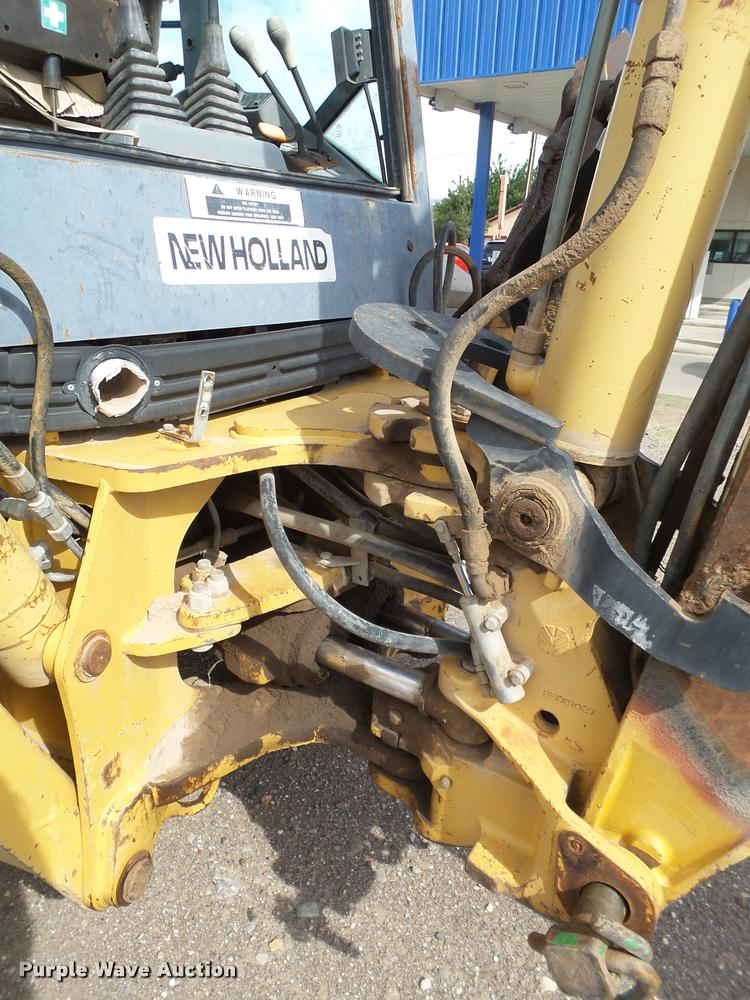 image for item L1519 Ford 555E backhoe