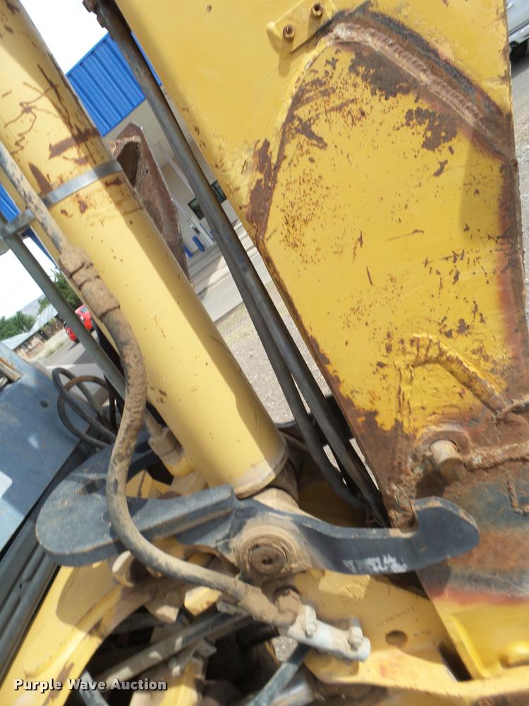 image for item L1519 Ford 555E backhoe