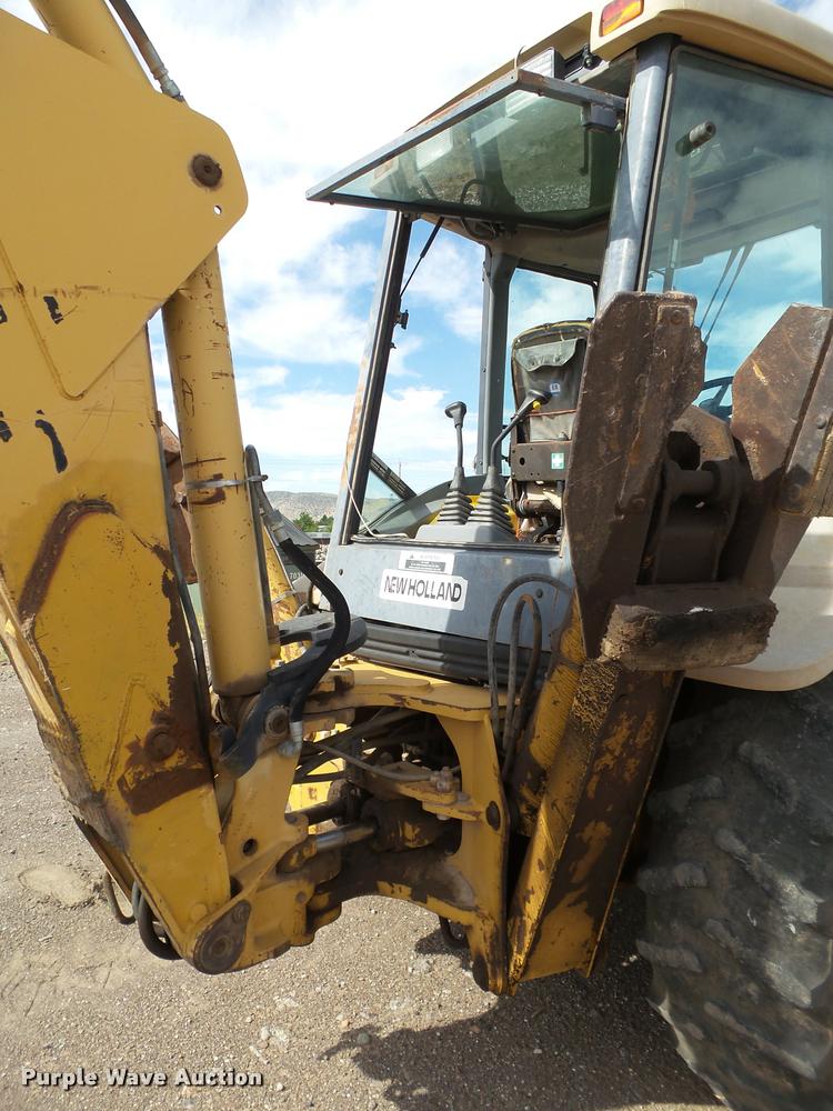 image for item L1519 Ford 555E backhoe