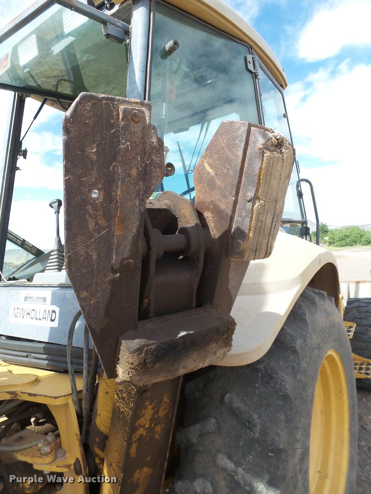 image for item L1519 Ford 555E backhoe