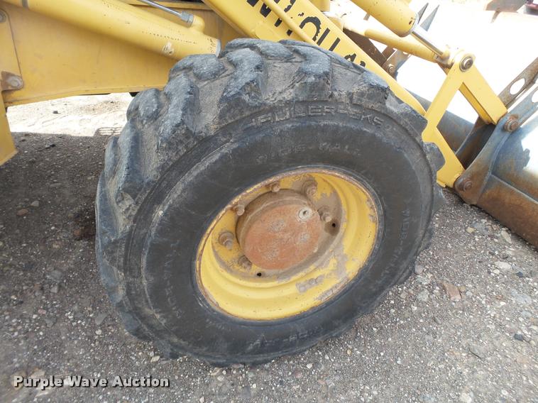 image for item L1519 Ford 555E backhoe