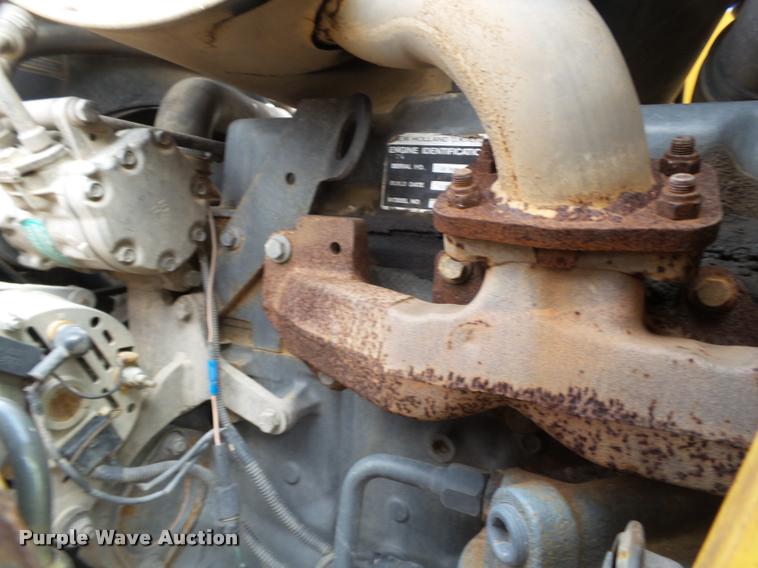 image for item L1519 Ford 555E backhoe