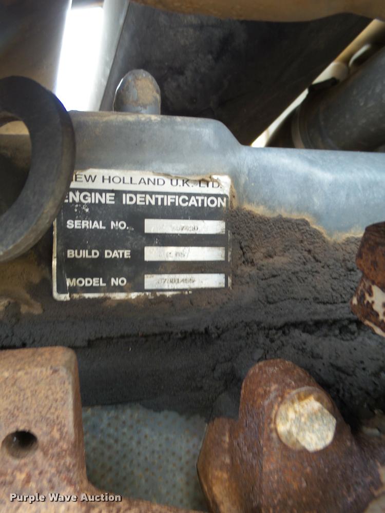 image for item L1519 Ford 555E backhoe