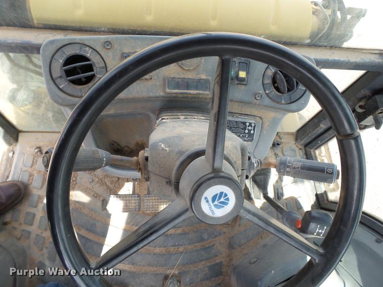 image for item L1519 Ford 555E backhoe