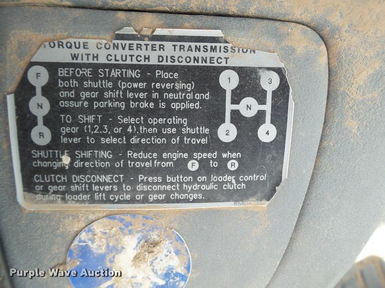 image for item L1519 Ford 555E backhoe