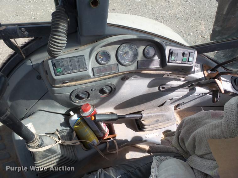 image for item L1519 Ford 555E backhoe