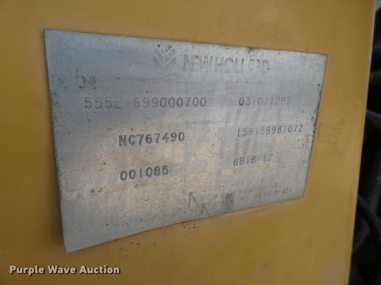 image for item L1519 Ford 555E backhoe