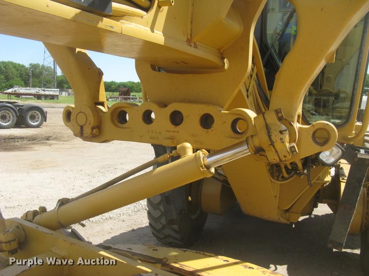 image for item L2333 2001 Caterpillar 140H motor grader