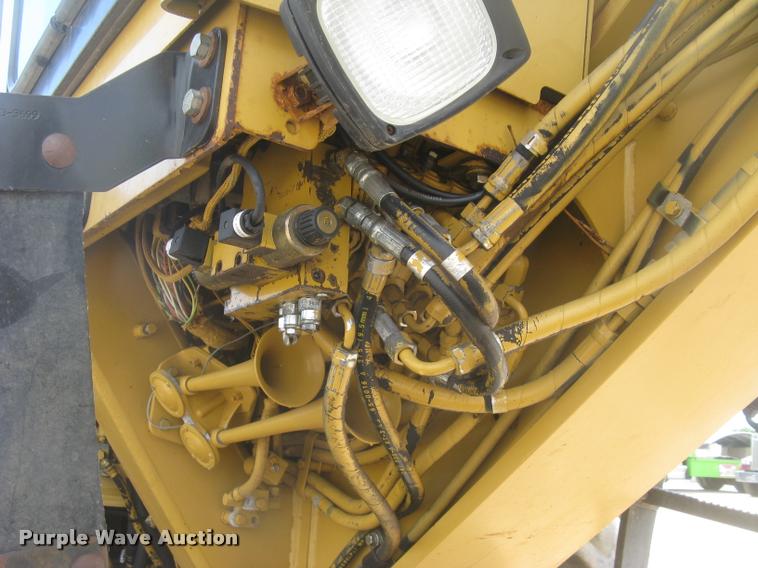 image for item L2333 2001 Caterpillar 140H motor grader