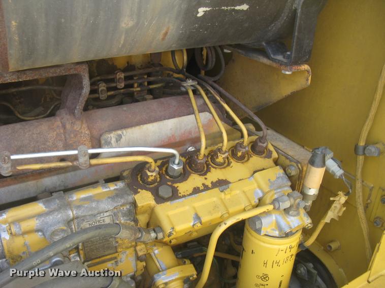 image for item L2333 2001 Caterpillar 140H motor grader